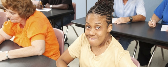 African American Woman sitting at table