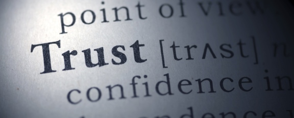 photo of dictionary text of word Trust