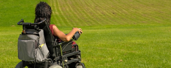 graphic of woman in wheelchair shaking a man's hand